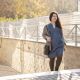 full-shot-woman-walking-up-stair